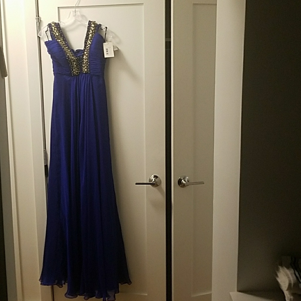 Brand new evening gown blue with sequin's
